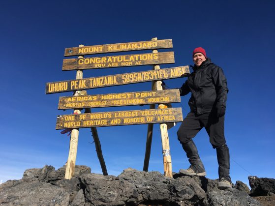 Jeff at the summit of Mt. Kilimanjaro in Africa.